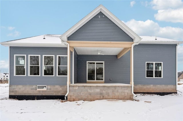 view of snow covered property