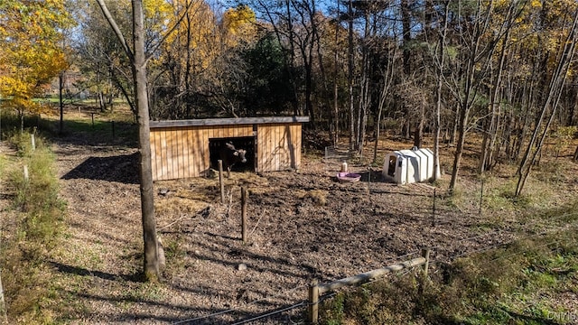 exterior space with an outbuilding