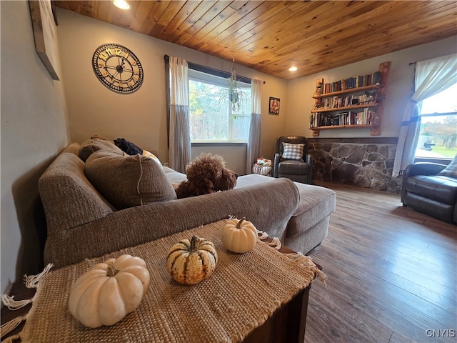 living room with hardwood / wood-style flooring and wood ceiling