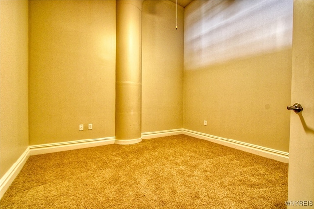 empty room featuring carpet floors