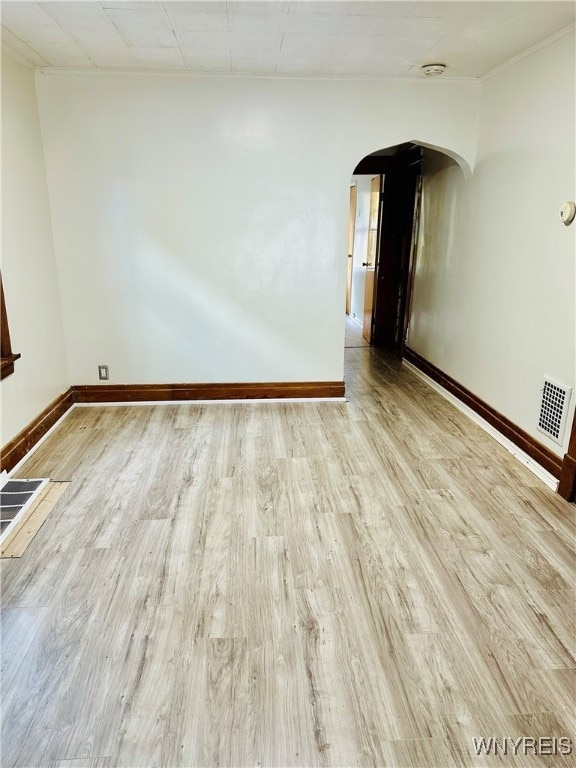 unfurnished room featuring light hardwood / wood-style floors