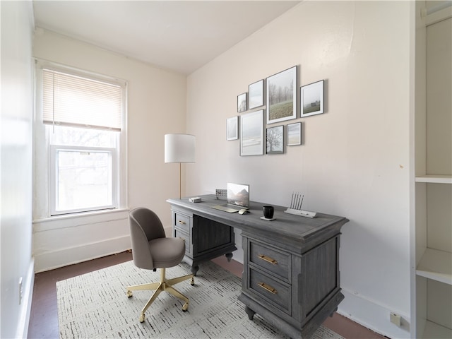 office space with light hardwood / wood-style flooring