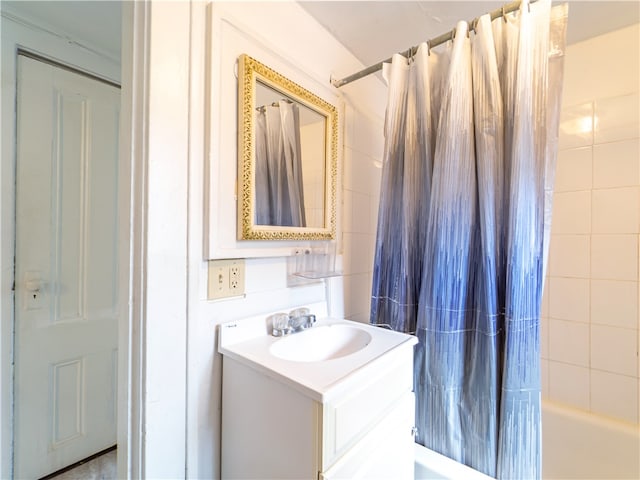 bathroom with vanity and shower / bath combination with curtain