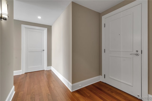 hall featuring wood-type flooring