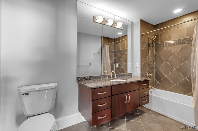 full bathroom with vanity, tile patterned flooring, toilet, and shower / tub combo with curtain