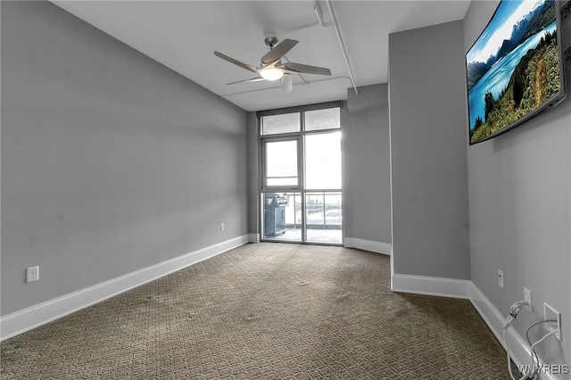 carpeted empty room with ceiling fan