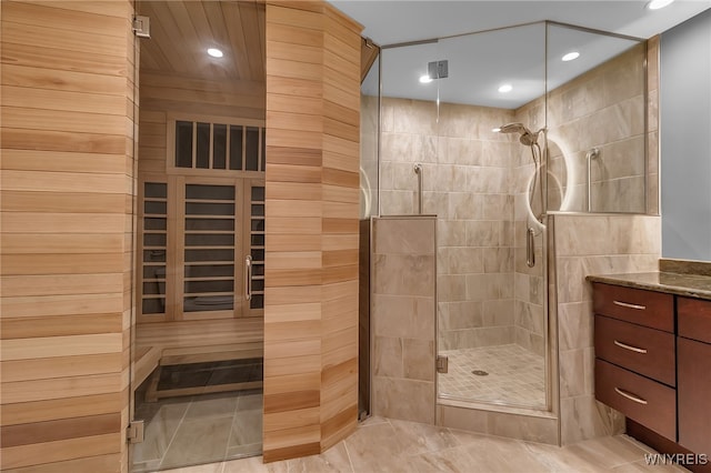 bathroom with vanity and walk in shower