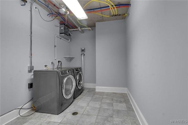 washroom featuring independent washer and dryer