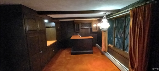 bathroom featuring baseboard heating and beam ceiling