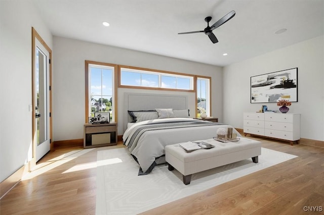 bedroom featuring ceiling fan and light wood-type flooring