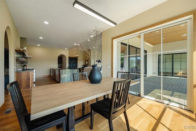 dining area with light wood-type flooring