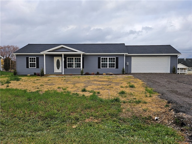 single story home featuring a garage