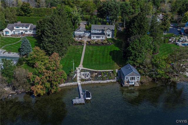 birds eye view of property with a water view