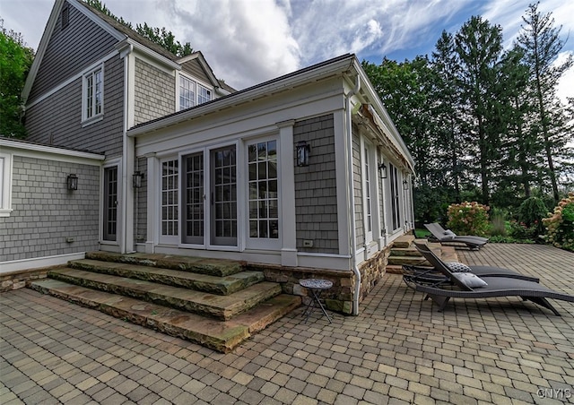 rear view of property with a patio area