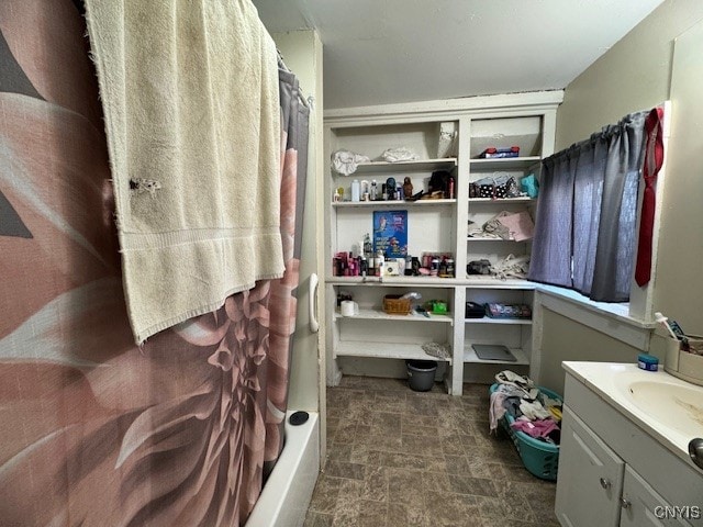 walk in closet with sink