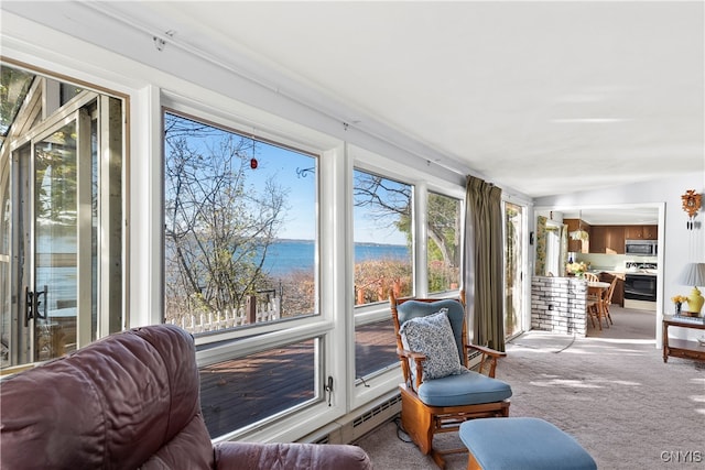 sunroom with a water view