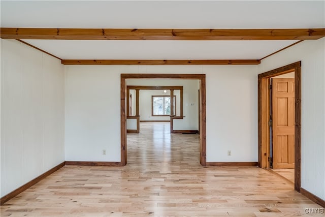 empty room with light hardwood / wood-style flooring