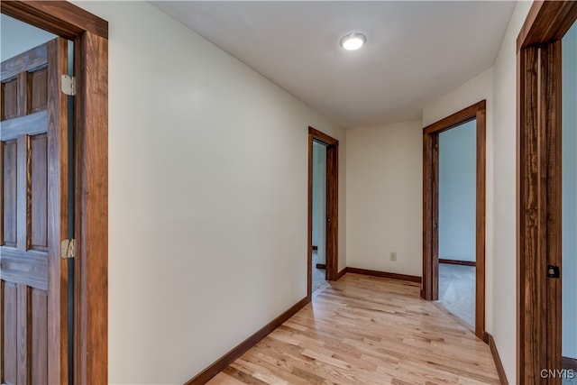 corridor featuring light wood-type flooring