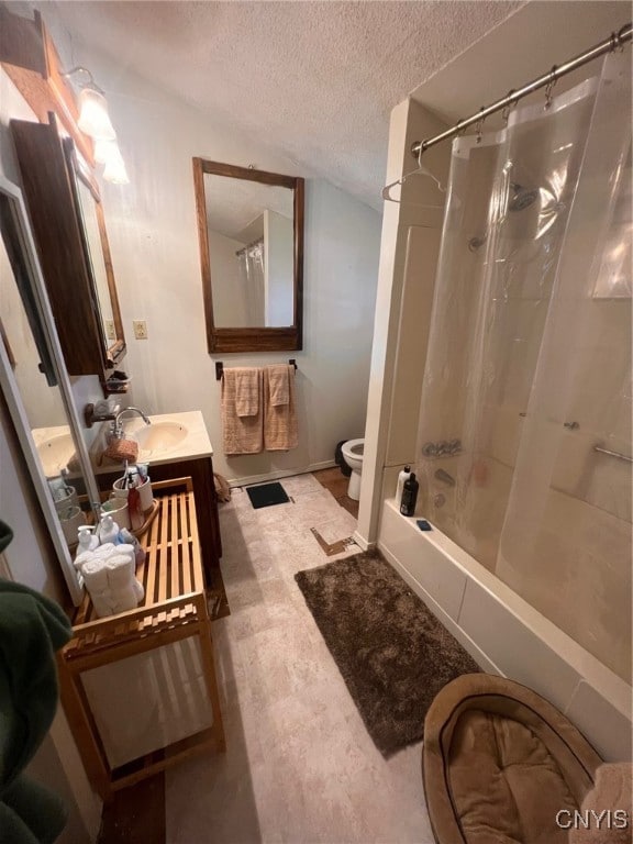 full bathroom with vanity, a textured ceiling, toilet, and shower / bathtub combination with curtain