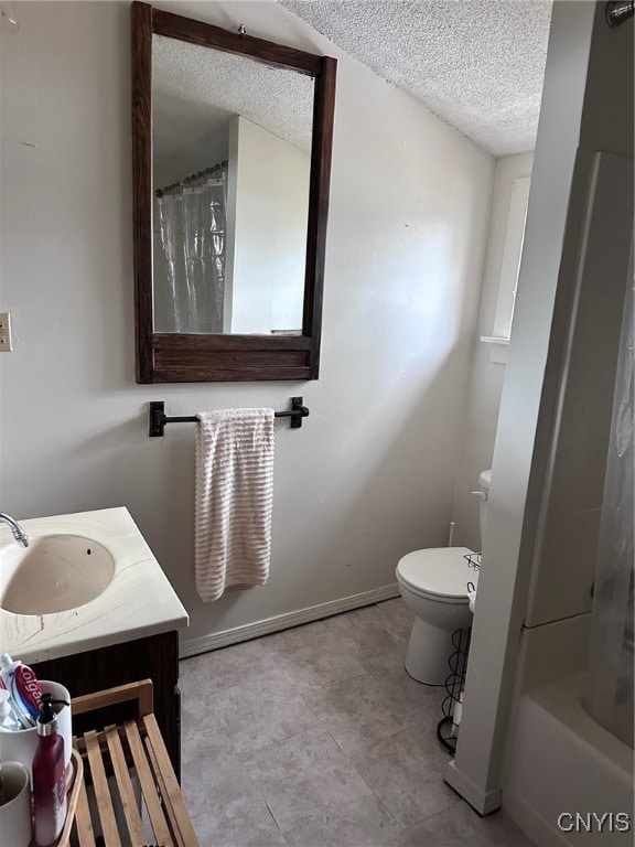 full bathroom with vanity, a textured ceiling, toilet, and shower / tub combo with curtain