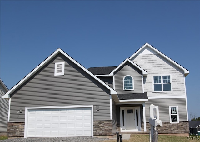 view of front of property with a garage