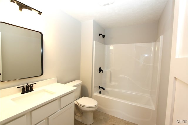 full bathroom featuring toilet, tile patterned flooring, a textured ceiling, vanity, and bathtub / shower combination