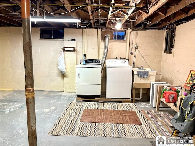 laundry area featuring washing machine and clothes dryer