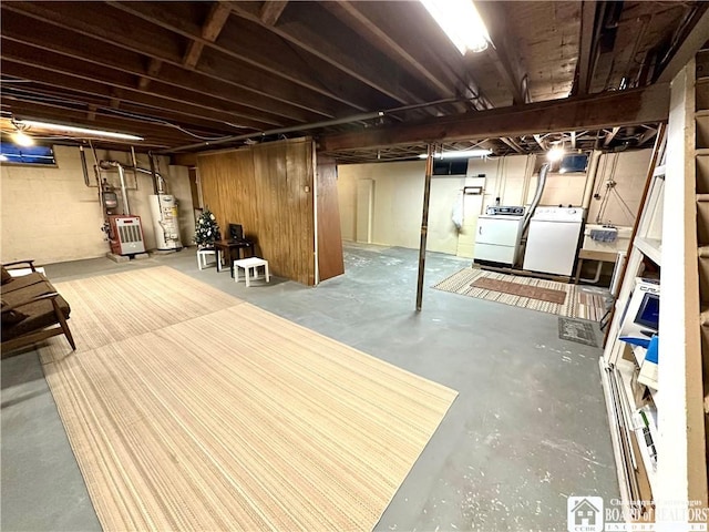 basement with separate washer and dryer and gas water heater