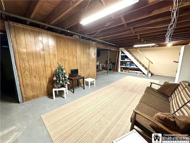 basement with wooden walls