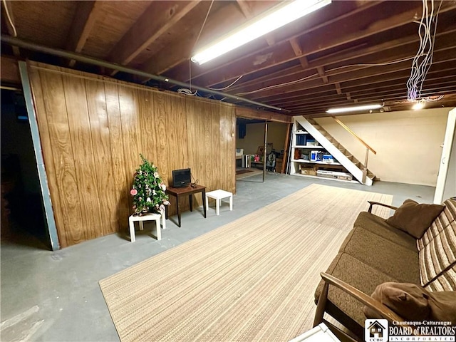 basement with wooden walls