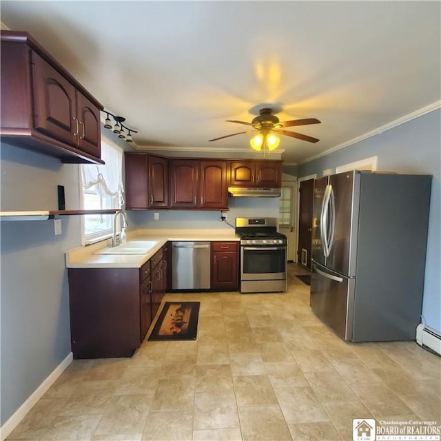 kitchen featuring appliances with stainless steel finishes, sink, ceiling fan, crown molding, and track lighting