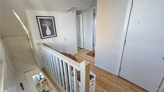 corridor featuring light hardwood / wood-style floors