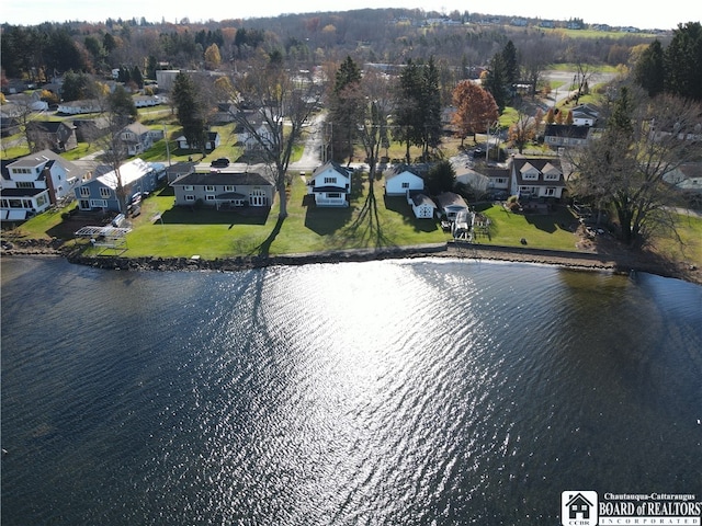 bird's eye view with a water view