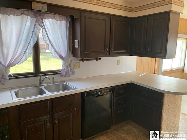 kitchen featuring dishwasher, kitchen peninsula, a wealth of natural light, and sink