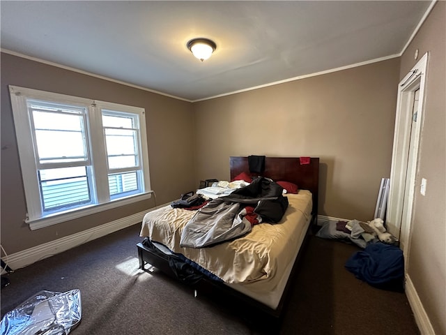 carpeted bedroom with ornamental molding