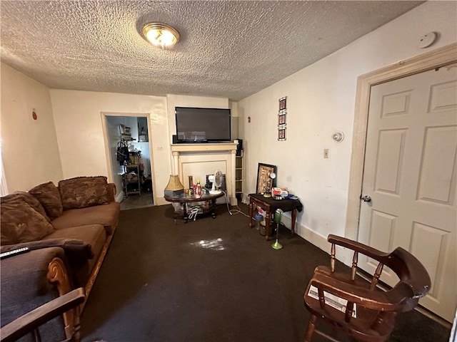 living room featuring a textured ceiling