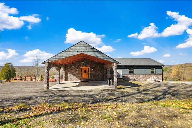 surrounding community featuring a patio area