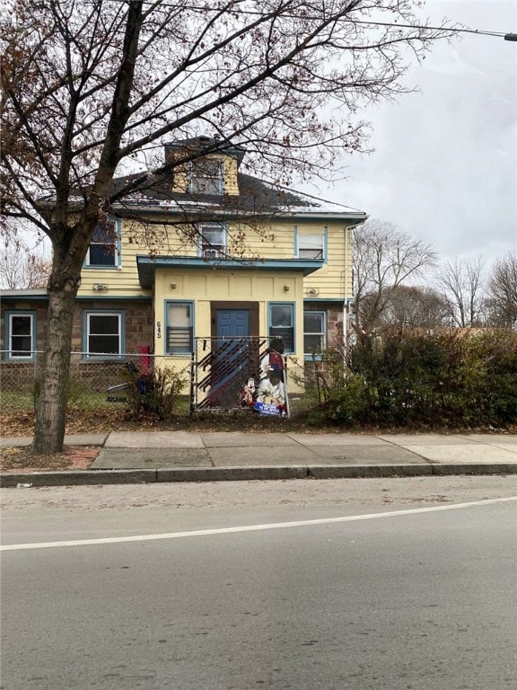 645 Hudson Ave, Rochester, NY 14621 - view of front of house featuring a fenced front yard and stone siding