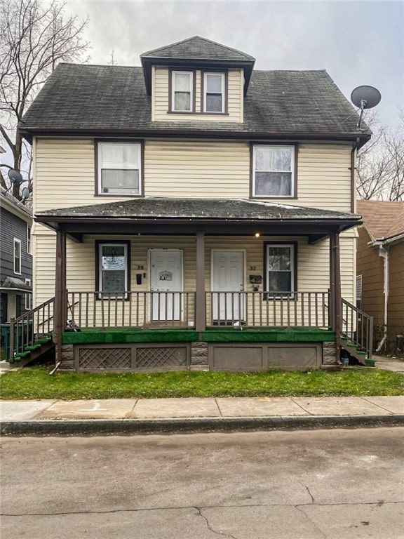 front of property featuring a porch