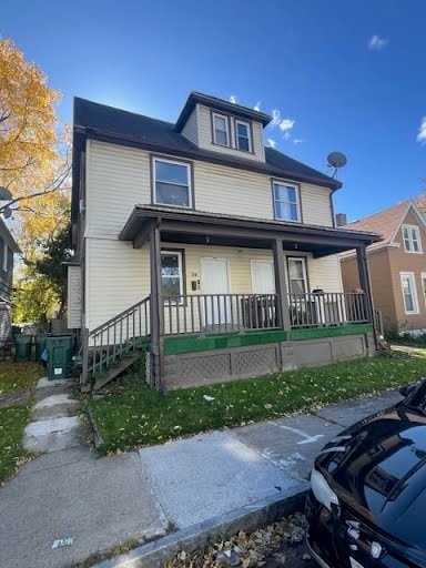 view of front of home featuring covered porch