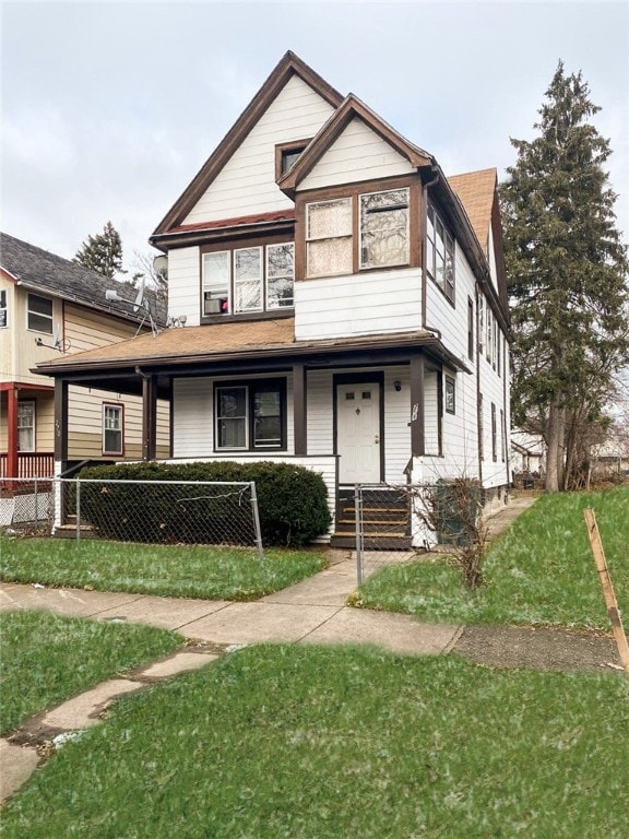 view of front of property with a front lawn