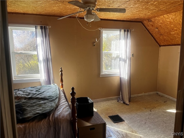 bedroom with lofted ceiling and ceiling fan