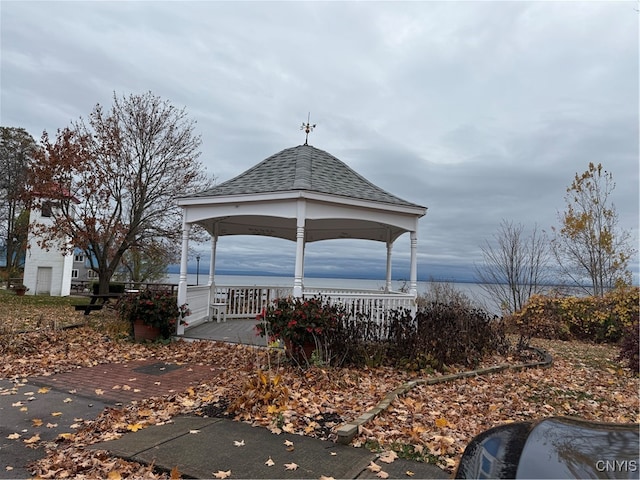 exterior space featuring a water view and a gazebo