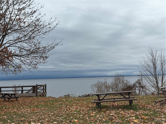 exterior space with a water view