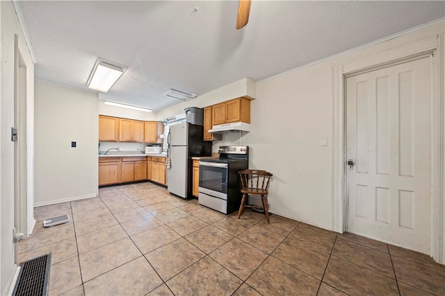 kitchen featuring stainless steel appliances, ceiling fan, light tile patterned floors, and sink