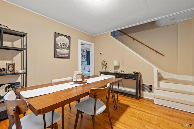 dining room featuring light hardwood / wood-style flooring