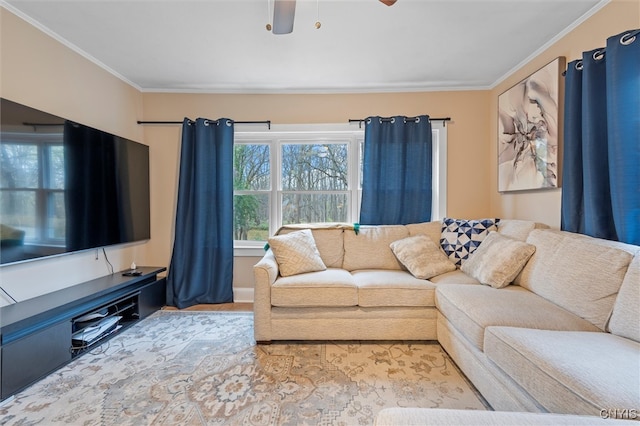 living room with ceiling fan and crown molding