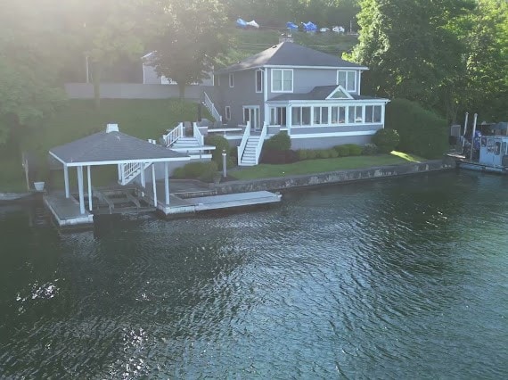 dock area featuring a water view and a gazebo