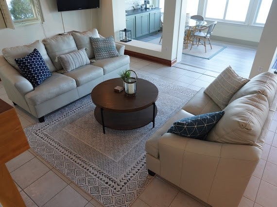 living room featuring light tile patterned floors