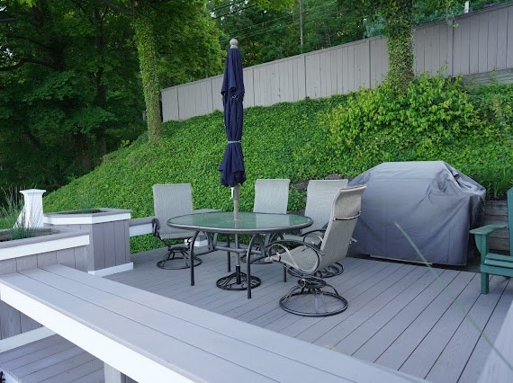 wooden deck featuring grilling area